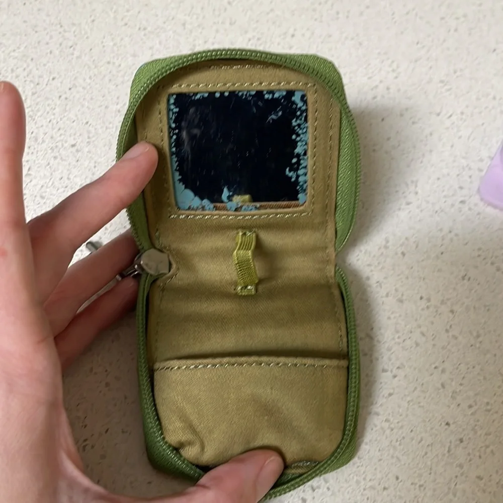 Fossil green leather travel contact lens carrying case